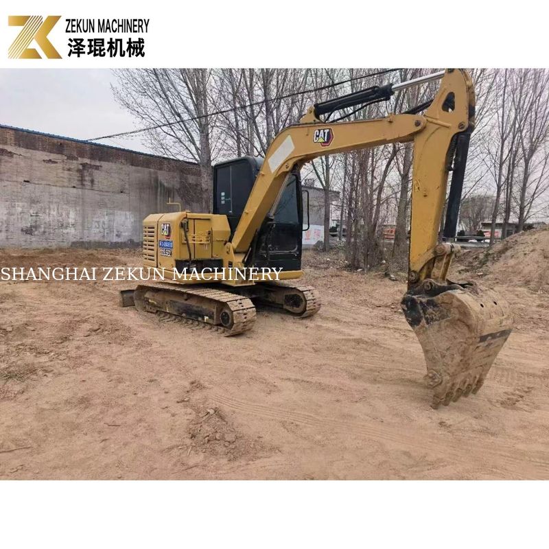 CAT 305.5E2 Excavadora de rastreo de 5.5 toneladas con pulgar hidráulico de Caterpillar