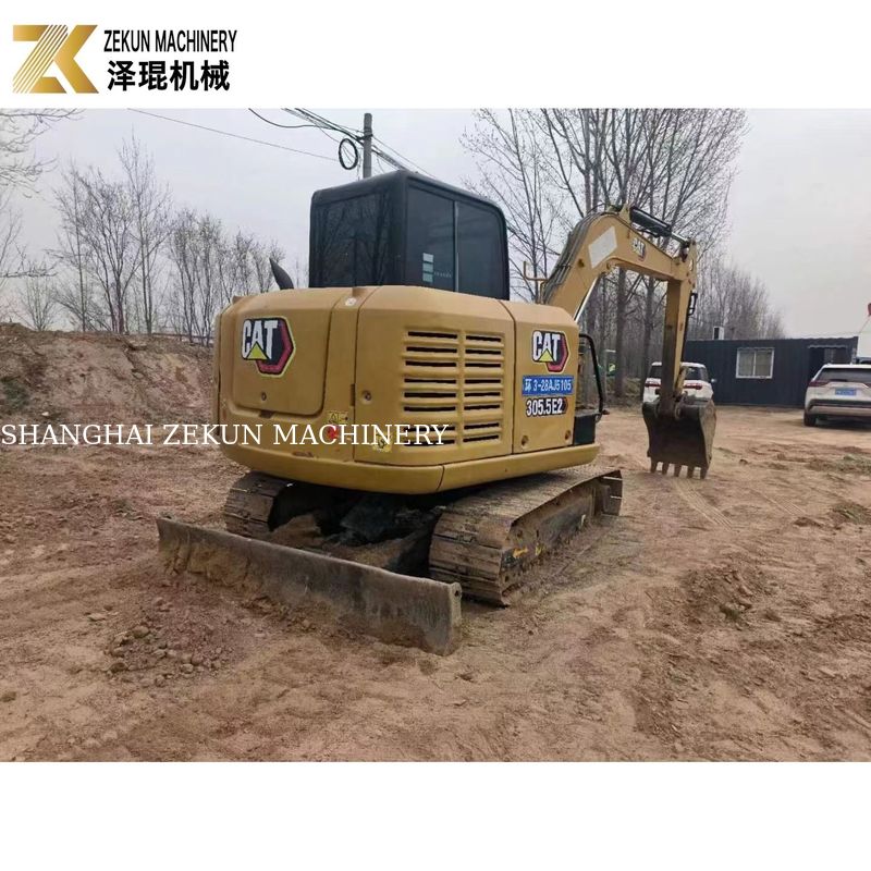 CAT 305.5E2 Excavadora de rastreo de 5.5 toneladas con pulgar hidráulico de Caterpillar