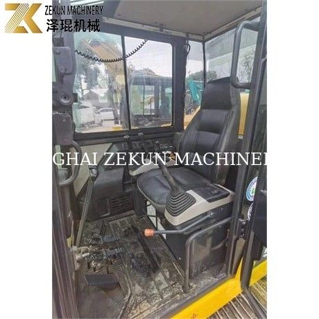 Mini excavadora Komatsu PC56-7 con 5 toneladas de peso operativo y motor diesel duradero