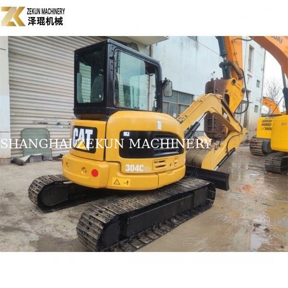 Excavadora de 4 toneladas usada CAT 304 con cabina cerrada y cilindro hidráulico original