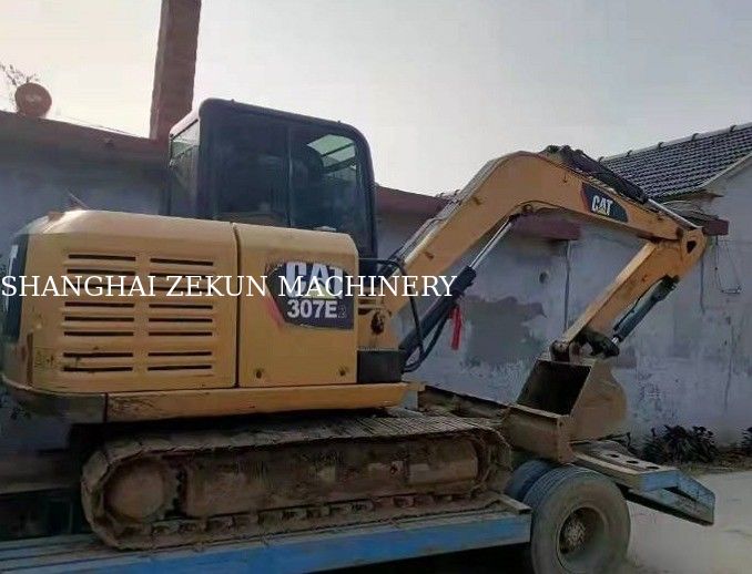 Excavadora de segunda mano de fabricación japonesa con motor C2.6 DI